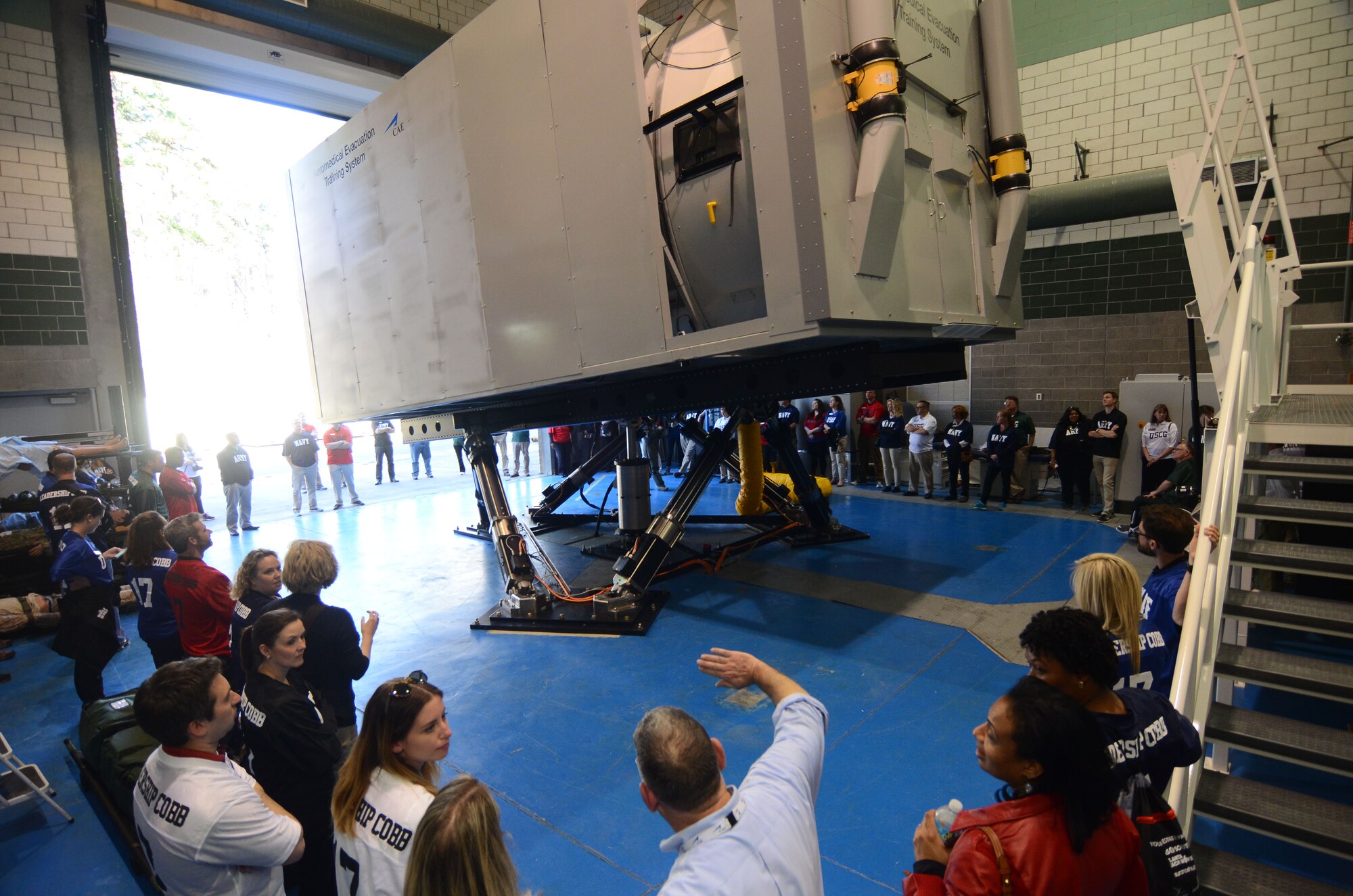 Members of the Leadership Cobb program witness the first public in-motion demonstration of the Aeromedical Evacuation Training System during a tour of Dobbins Air Reserve Base, Ga. March 8, 2017.  The medical simulator is operated by the 94th Aeromedical Evacuation Squadron personnel and is designed to provide realistic training scenarios encountered by AES personnel. (U.S. Air Force photo/Don Peek)