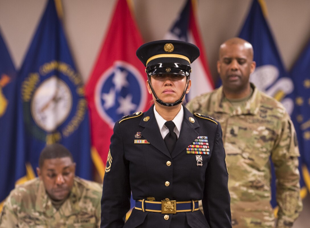 Sgt. 1st Class Joanna Carter, U.S. Army Human Resources Command, performs facing movements during a phase II appearance board at Fort Knox, Ky., Mar. 10. Carter was one of five Soldiers competing for a spot on the unit's Honor Guard team. During the selection board Soldiers were asked questions on topics ranging from Military history to funeral honors. They were also asked to perform ceremonial facing movements they would use during various events.