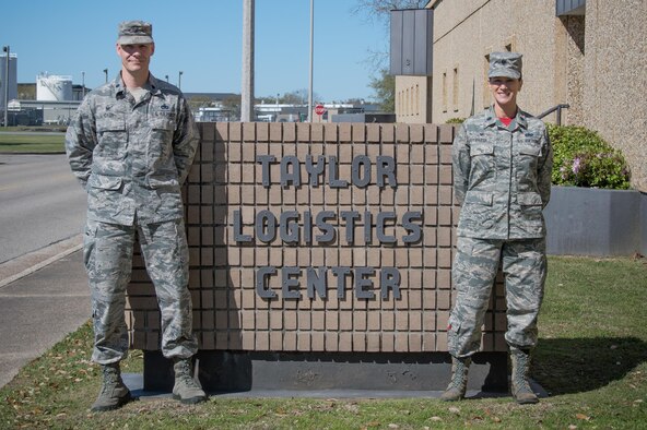 Lt. Col. Clinton Cash, 403rd Logistics Readiness Squadron commander and Lt. Col. Melissa Rativa, 81st LRS commander, pose for a photo March 2 at the Taylor Logistics Center on Keesler Air Force Base, Mississippi. (U.S. Air Force photo/Staff Sgt. Heather Heiney)