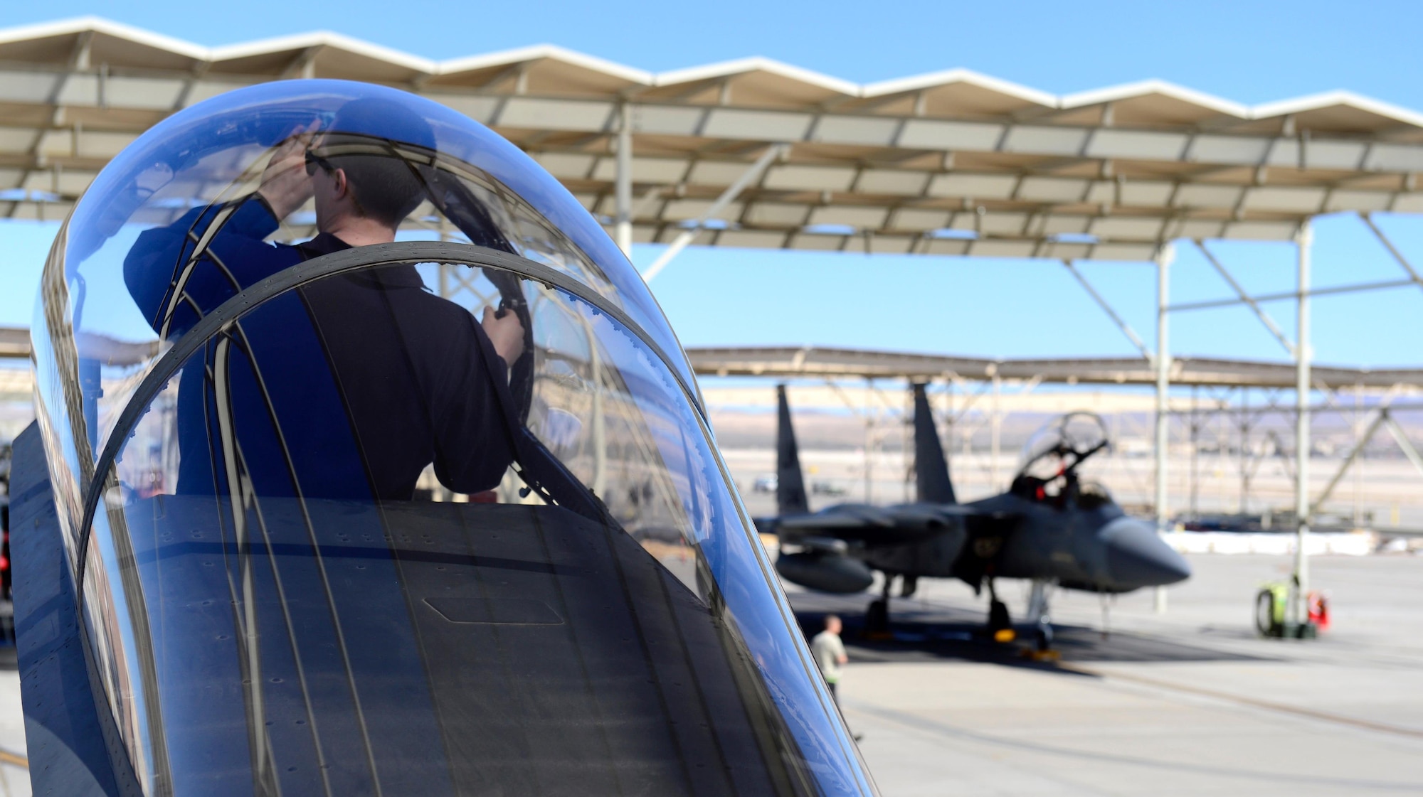 A 493rd Aircraft Maintenance Unit Airman from Royal Air Force Lakenheath, England, prepares an F-15C Eagle during exercise Red Flag 17-2 at Nellis Air Force Base, Nev., Mar. 3. Red Flag provides an opportunity for the 493rd Fighter Squadron aircrew and maintainers to enhance their tactical operational skills alongside military aircraft from coalition forces.(U.S. Air Force photo/Senior Airman Malcolm Mayfield)