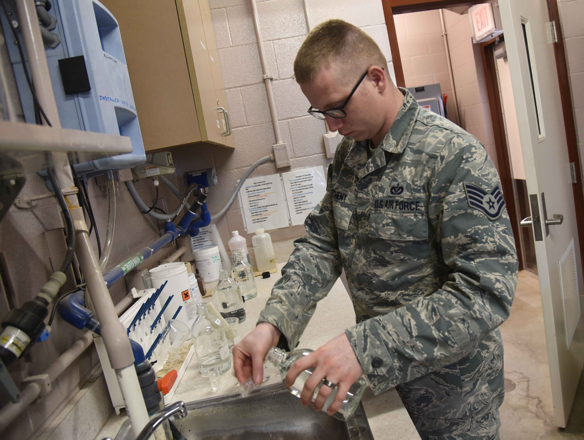 Staff Sgt. Shane Pentheny, 22nd Civil Engineer Squadron Water and Fuels System Maintenance technician, performs water-quality tests on water taken from several base buildings March 9, 2017, at McConnell Air Force Base, Kan. In addition to WFSM’s daily tests, the 22nd Aerospace Medicine Squadron Bioenvironmental Engineering flight performs more in-depth tests on a weekly basis. (U.S. Air Force photo/Airman 1st Class Erin McClellan)