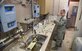 Staff Sgt. Shane Pentheny, 22nd Civil Engineer Squadron Water and Fuels System Maintenance technician, performs water-quality tests on water taken from several base buildings March 9, 2017, at McConnell Air Force Base, Kan. WFSM tests chlorine, fluoride and pH levels daily to ensure the base populace receives quality water. (U.S. Air Force photo/Airman 1st Class Erin McClellan)