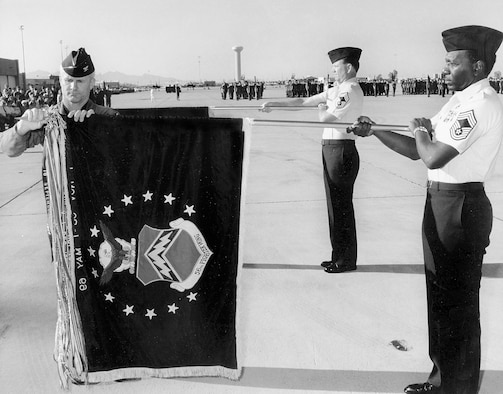 The 56th Fighter Wing flag with its many campaign and awards streamers was unfurled for the first time April 1, 1994, when the wing took over host unit duties. (Courtesy Photo)