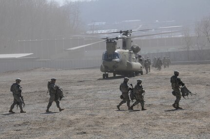 Students from 8th Army Wightman Noncommissioned Officer Academy disembark from a 2nd Combat Aviation Brigade, 2nd Infantry Division/ROK-US Combined Division CH-47 Chinook helicopter at Rodriguez Live Fire Complex March 6, 2017. The student flew to RFLC as part of the last training events prior to graduation on March 10. 
