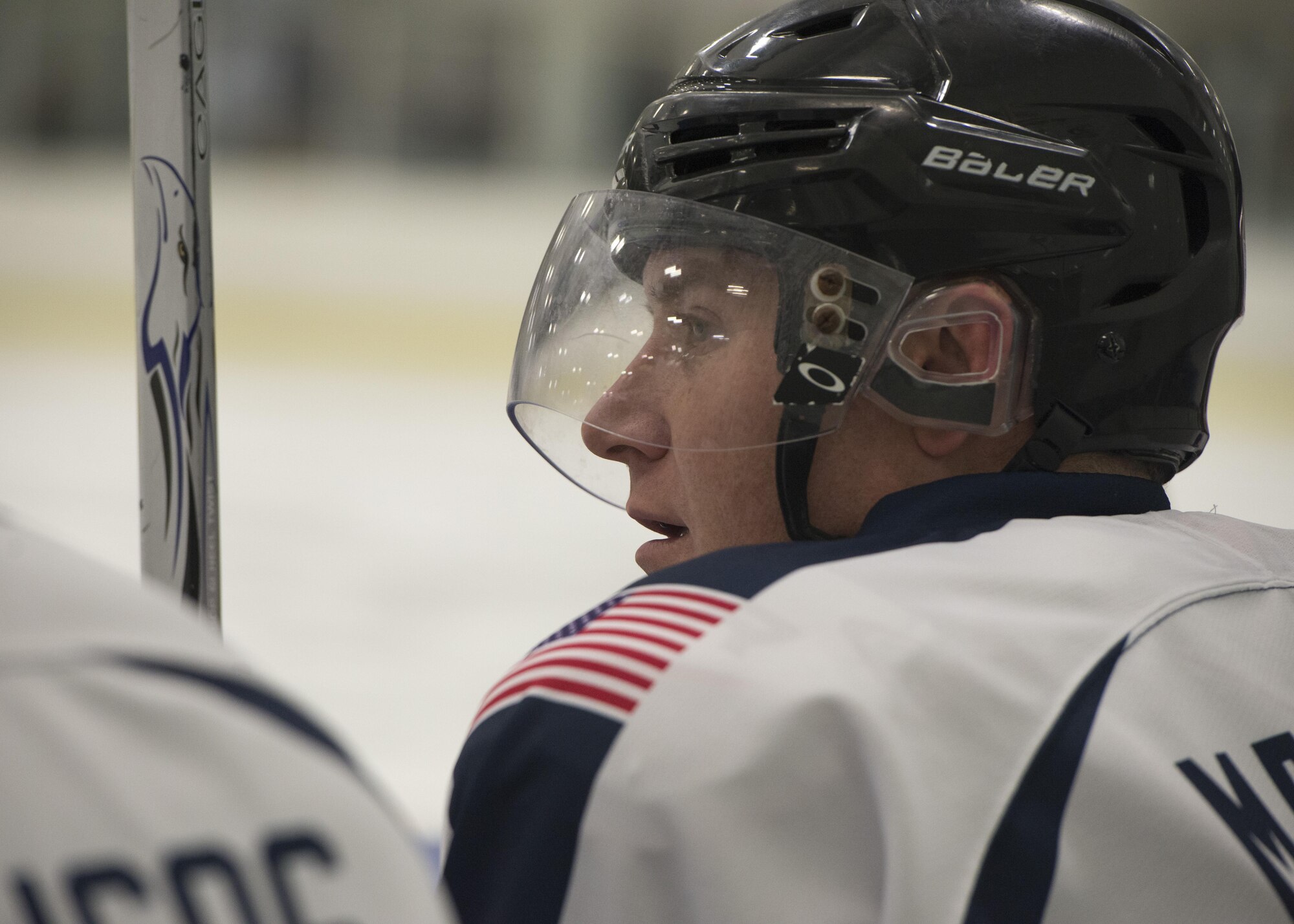 Donny Maheux, Dover Eagles forward, watches gameplay from the bench during a charity hockey game March 11, 2017, at the Centre Ice Rink in Harrington, Del. The Dover Eagles hockey team is comprised of active duty and Reserve Airmen, along with military dependents, Civil Air Patrol members, Department of Defense civilian employees and military retirees and veterans. (U.S. Air Force photo by Senior Airman Zachary Cacicia)