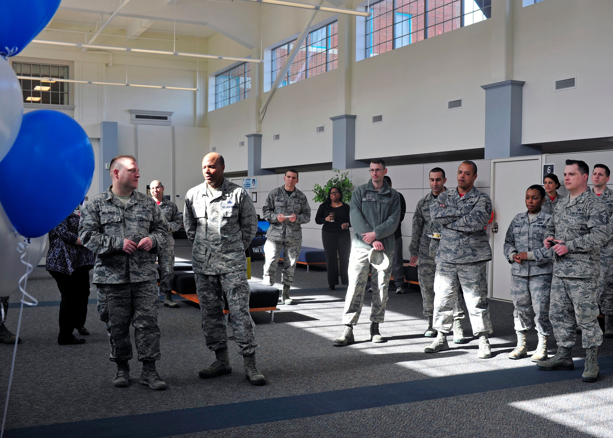 Airmen assigned to Joint Base Lewis-McChord, Wash., watch a presentation about the Air Force Aid Society during the organization’s 75th Anniversary Celebration, March 10, 2017 at the Military Personnel Section on McChord Field. AFAS dates back to 1942 when Gen. Henry “Hap” Arnold , Commanding General of the Army Air Forces, and his wife, Bee, turned the ideal of ‘Airmen helping Airmen’ into a reality. (U.S. Air Force photo/Staff Sgt. Whitney Amstutz) 