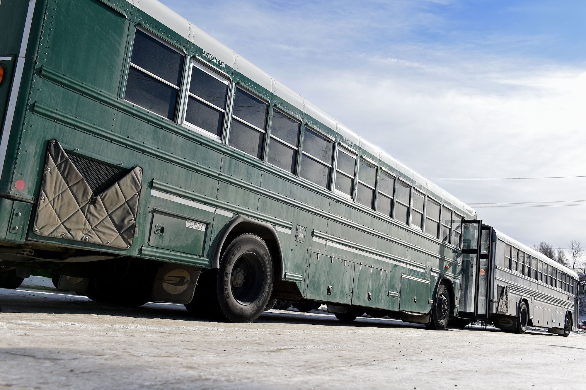 Buses of the 773d Logistics Readiness Squadron, recently loaded with Soldiers of the 1st Battalion, 501st Parachute Infantry Regiment, 4th Infantry Brigade Combat Team (Airborne), 25th Infantry Division U.S. Army Alaska ready to depart to a week-long field training exercise, March 13, 2017. At JBER, roughly 80 percent of the 773d LRS vehicle operator support is to the Army.