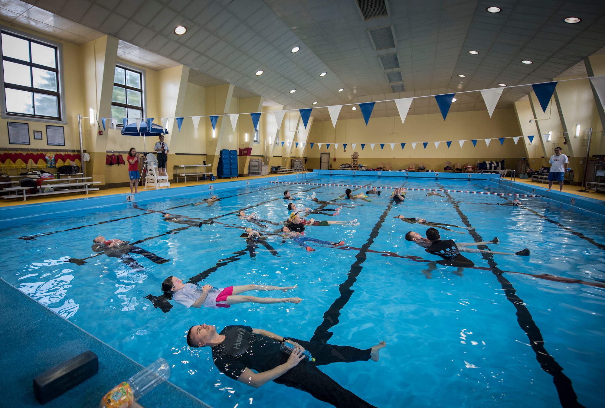 Members from Misawa Air Base learn the technique of Uitemate, a water survival method used by persons floating in water waiting to be rescued, at Misawa Air Base, Japan, March 12, 2017. The Society of Water Rescue and Survival Research taught the course as one way to thank the U.S. for their assistance after the Great East Japan Earthquake rattled the country of Japan. (U.S. Air Force photo by Tech. Sgt. Araceli Alarcon)