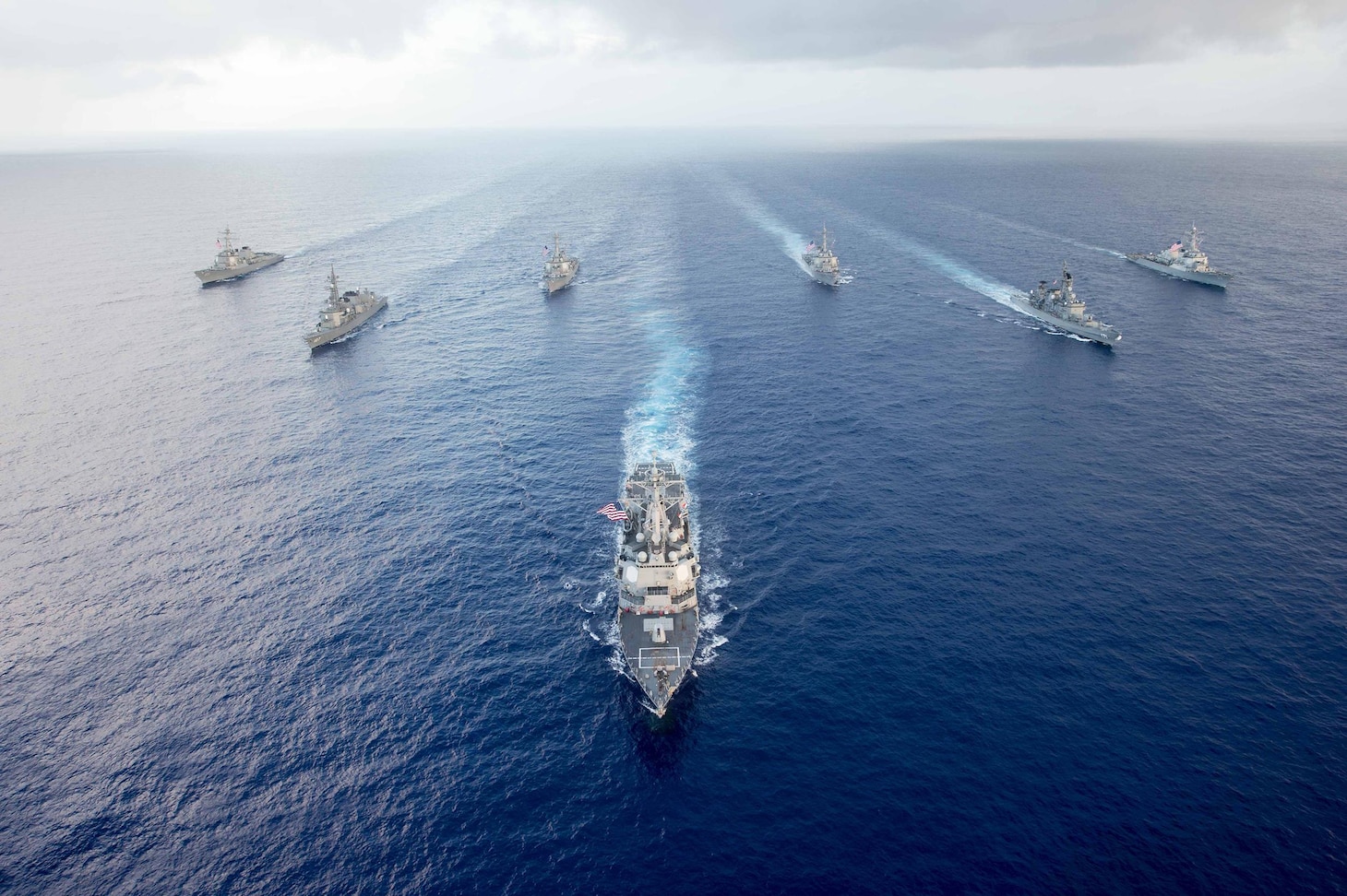 The Arleigh Burke-class guided-missile destroyer USS Mustin (DDG 89) leads U.S. Navy and Japan Maritime Self-Defense Force (JMSDF) ships in formation during MultiSail 17. MultiSail 17 is a bilateral training exercise improving interoperability between the U.S. and Japanese forces.  This exercise benefits from realistic, shared training enhancing our ability to work together to confront any contingency. 