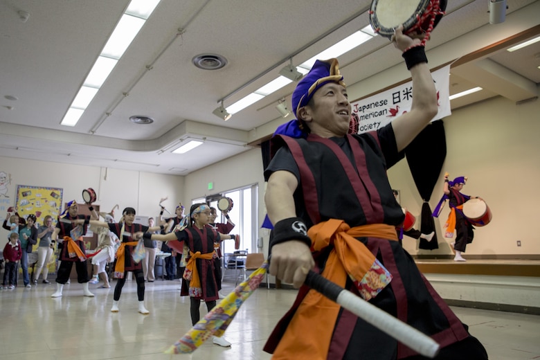 Local Japanese volunteers with the Japanese American Society perform the Eisa Okinawan Dance during the 60th Annual Culture Festival at Marine Corps Air Station Iwakuni, Japan, March 11, 2017. The festival included Japanese dance performances, decorated exhibits and traditional activities and rituals. JAS continues to bridge the U.S.-Japan friendship by providing quality cultural events and activities. (U.S. Marine Corps photo by Lance Cpl. Carlos Jimenez)