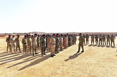 Col. Mohammad Hami Moussa, an Iraqi commander, inspects the first graduating company of a unique, multi-tribe Iraqi force, the A'ali Al Furat Brigade, at a training ground in Western Iraq, Jan 7, 2017. The A'ali Al Furat Brigade, which has nearly 200 fighters from more than 20 tribes - the first multi-tribe unit formed in Iraq, is the first recorded tribal unit to receive Law of Armed Conflict and rules of engagement training specifically from a U.S. military Judge Advocate General through coordination with Coalition partners. CJTF-OIR is the global Coalition to defeat ISIS in Iraq and Syria.