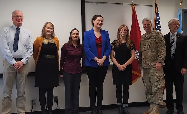 Several members of IWR’s Mentoring Committee met with General Stevens and were given coins during his visit, as seen in the group photo above.  