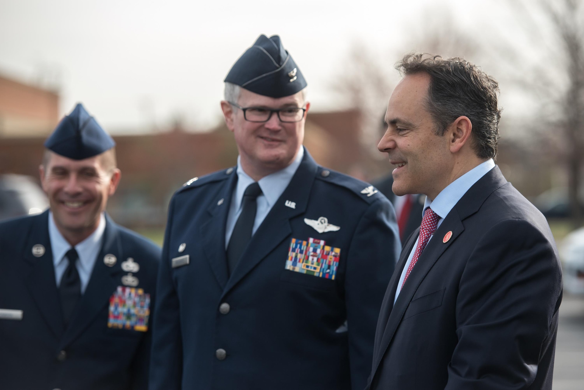 Kentucky Gov. Matt Bevin (right) talks with Col. David Mounkes, commander of the 123rd Airlift Wing, while they wait for Vice President Mike Pence to arrive at the Kentucky Air National Guard Base in Louisville, Ky., March 11, 2017. Pence was in Louisville to speak with local business leaders about health care and the economy. (U.S. Air National Guard photo by Staff Sgt. Joshua Horton)