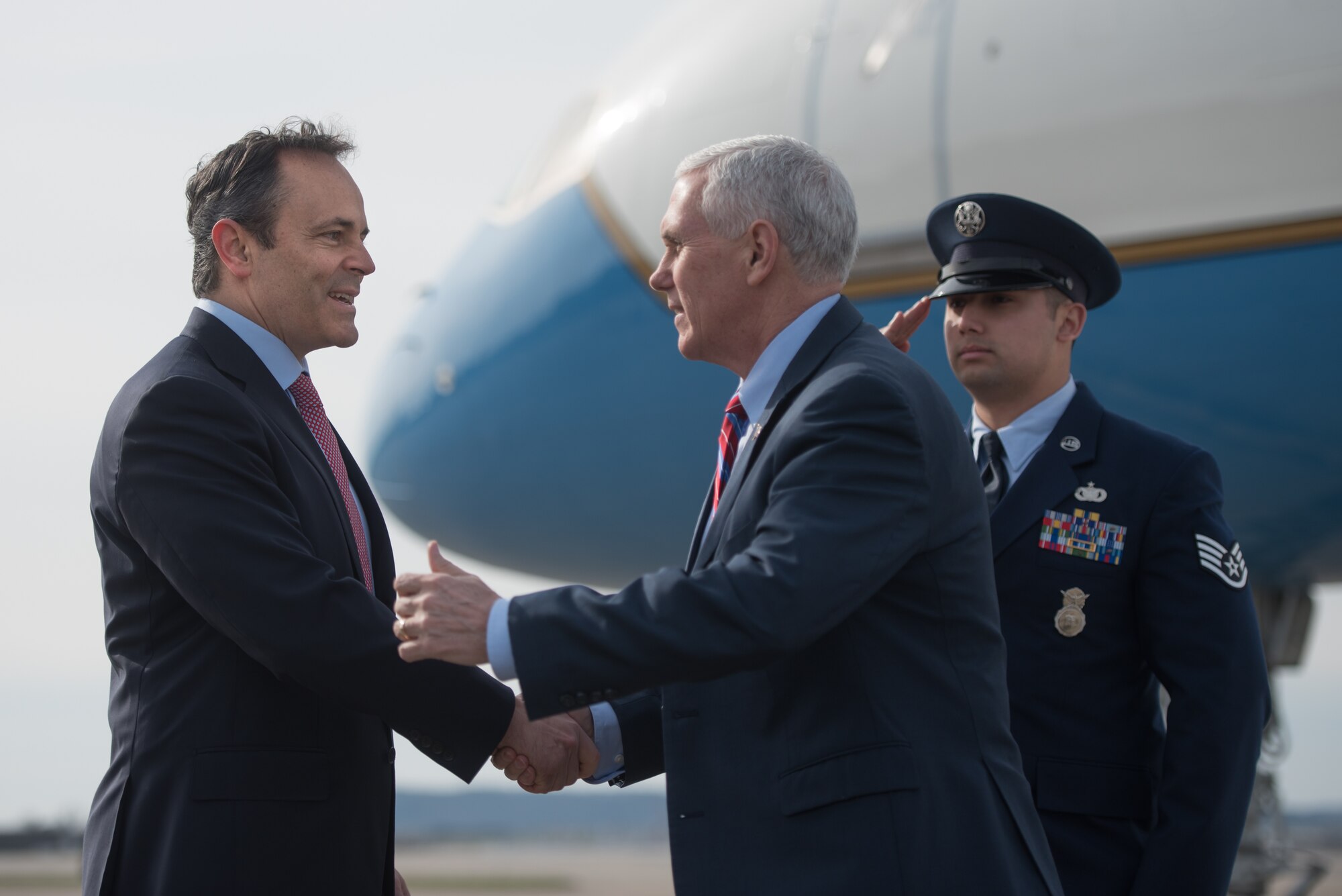 Kentucky Gov. Matt Bevin (left) greets Vice President Mike Pence (center) at the Kentucky Air National Guard Base in Louisville, Ky., March 11, 2017. Pence was in Louisville to speak with local business leaders about health care and the economy. (U.S. Air National Guard photo by Staff Sgt. Joshua Horton)