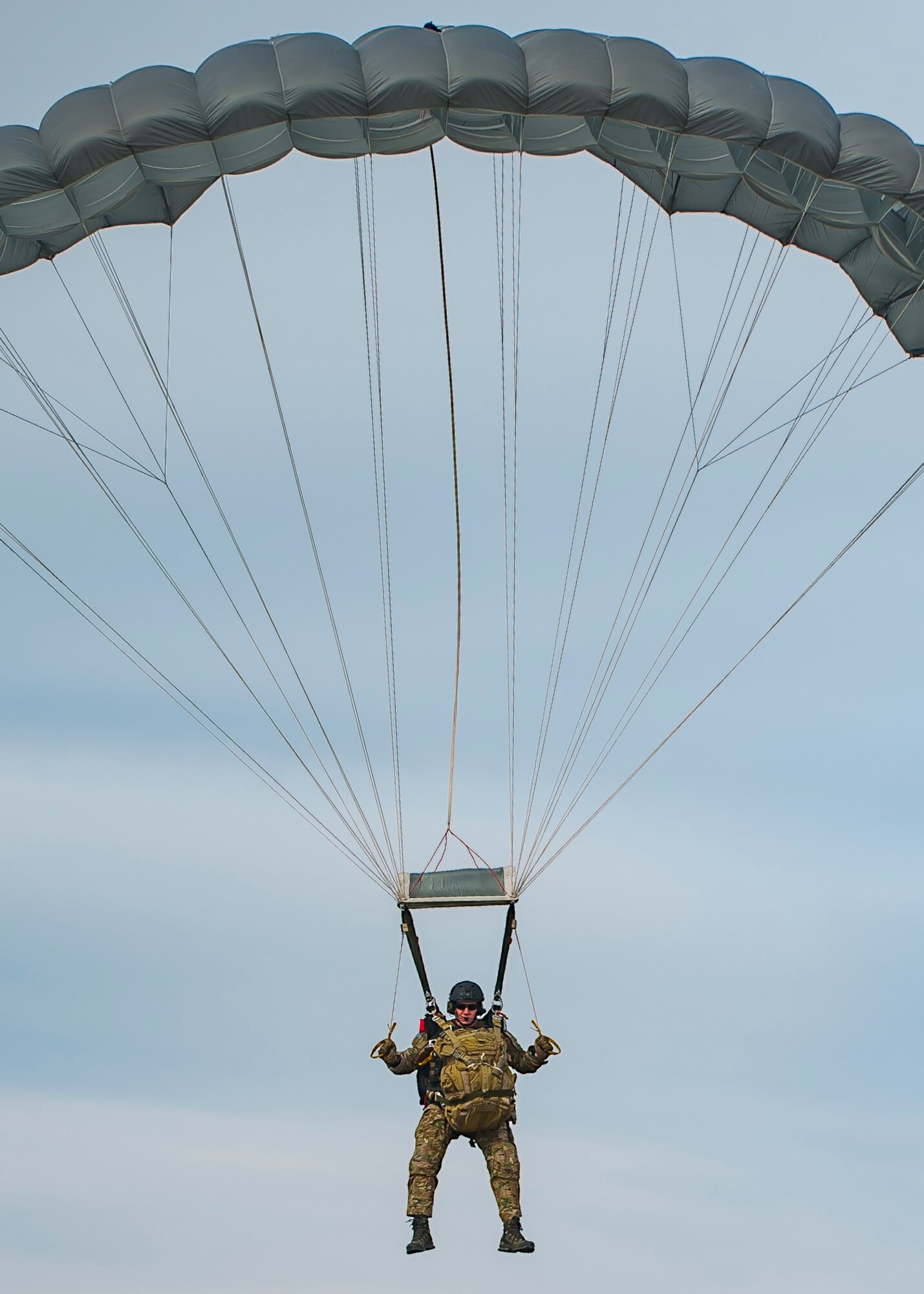 Chief Master Sgt. Mike Ziegler, 308th chief enlisted manager and pararescueman, parachutes to recover a simulated patient behind enemy territory, March 2, 2017, at the Orchard Combat Training Center in Idaho, during pre-deployment training for the 305th Rescue Squadron. The 305th RQS, located at Davis-Monthan Air Force Base, Ariz., is conducting training at the Idaho Air National Guard’s Orchard Combat Training Center, a 143,000-acre live-fire range located south of Boise, Idaho, to hone all of their search and rescue procedures before heading to Southwest Asia. (U.S. Air Force photo/Staff Sgt. Jared Trimarchi)