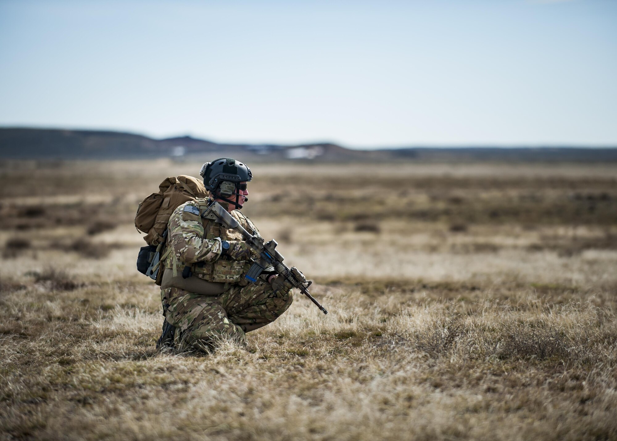 Chief Master Sgt. Mike Ziegler, 308th chief enlisted manager and pararescueman, watches his sector of fire, March 2, 2017, at the Orchard Combat Training Center in Idaho, during pre-deployment training for the 305th Rescue Squadron. The 305th RQS, located at Davis-Monthan Air Force Base, Ariz., is conducting training at the Idaho Air National Guard’s Orchard Combat Training Center, a 143,000-acre live-fire range located south of Boise, Idaho, to hone all of their search and rescue procedures before heading to Southwest Asia. (U.S. Air Force photo/Staff Sgt. Jared Trimarchi)