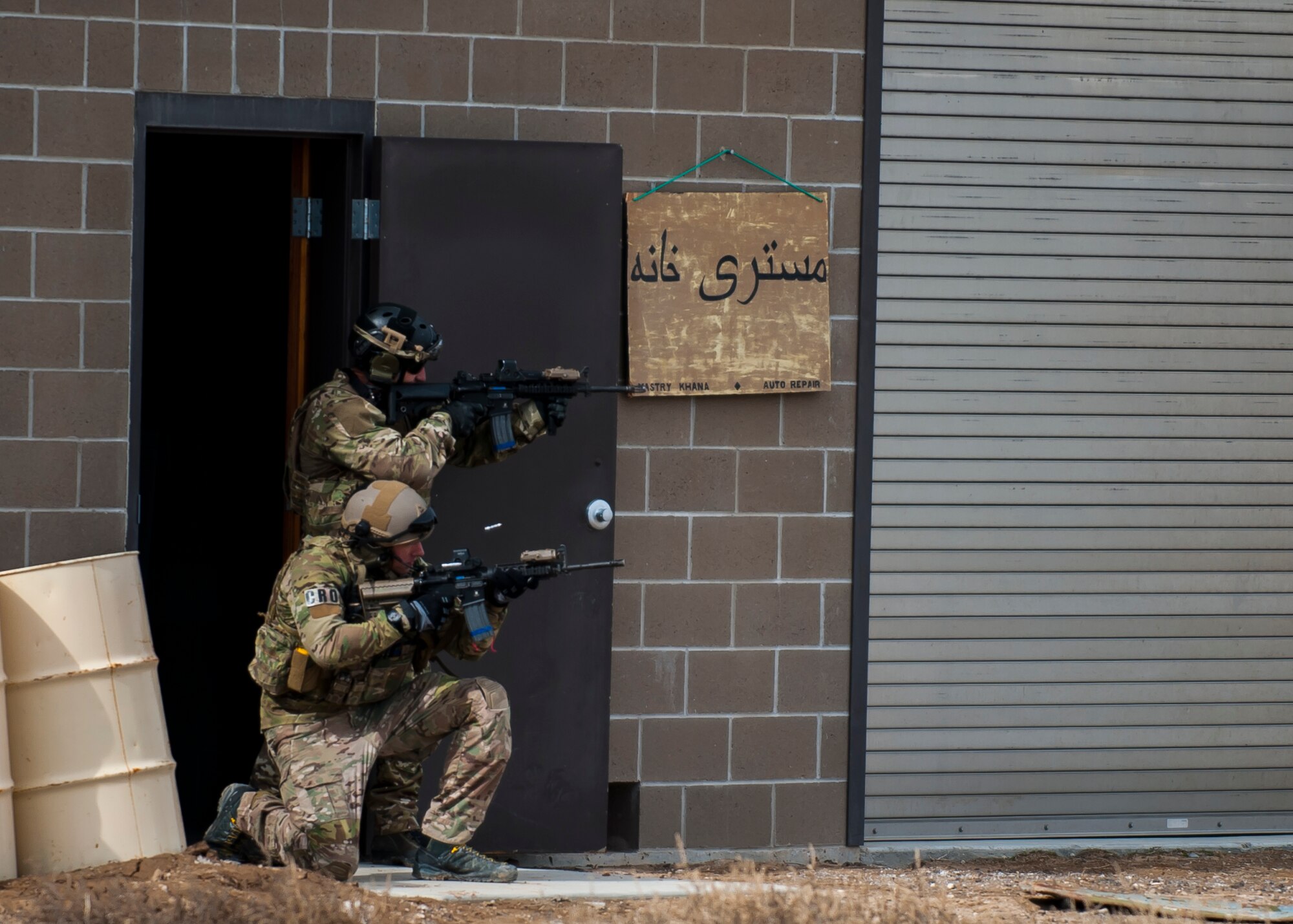 A pararescueman and a combat rescue officer, engage a target using simulated ammunition, March 2, 2017, at the Orchard Combat Training Center in Idaho, during pre-deployment training for the 305thRescue Squadron. The 305th RQS, located at Davis-Monthan Air Force Base, Ariz., is conducting training at the Idaho Air National Guard’s Orchard Combat Training Center, a 143,000-acre live-fire range located south of Boise, Idaho, to hone all of their search and rescue procedures before heading to Southwest Asia. (U.S. Air Force photo/Staff Sgt. Jared Trimarchi) 