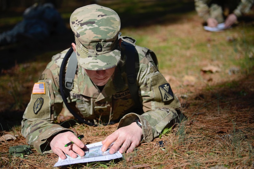 U.S. Army Sgt. 1st Class Robert Ellis, Charlie Company, 210th Aviation Regiment, 128th Aviation Brigade instructor and NCO of the Year competitor, prepares for the land navigation test during the NCO and Advanced Individual Training Platoon Sergeant of the Year Competition at Joint Base Langley-Eustis, Va., March 6, 2017. The Soldiers had to use basic urban orienteering abilities during the competition, which was designed to test different skills expected of every Soldier in the Army, regardless of their rank or profession. (U.S. Air Force photo/Airman 1st Class Kaylee Dubois)