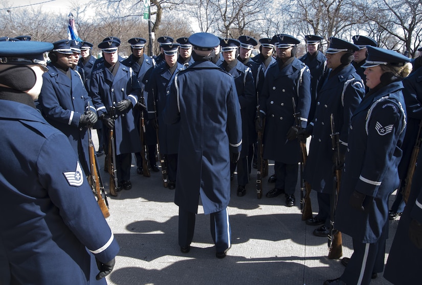 1st Lt. Riley Platt, U.S. Air Force standards and evaluations flight commander, briefs the team in preparation for the annual Chicago St. Patrick’s Day Parade, March 11, 2017. Logistical planning for the trip and event began approximately a year ago for the team of more than 40 honor guard Airmen. (U.S. Air Force photo by Senior Airman Jordyn Fetter)