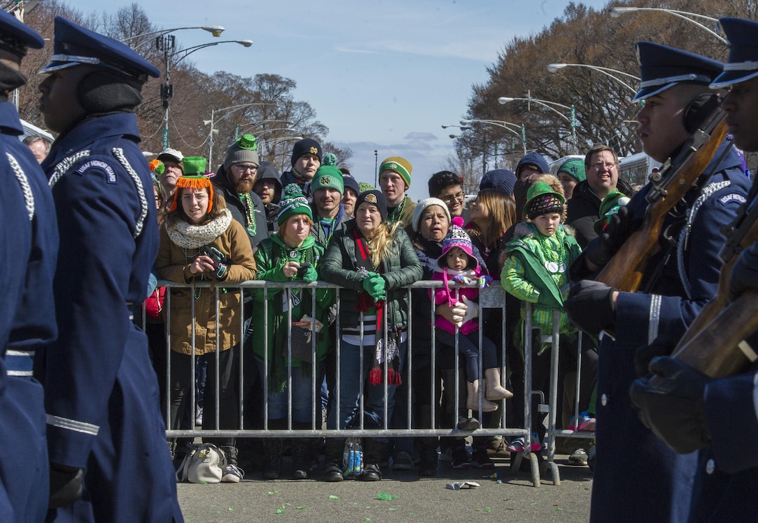 Onlookers watch the U.S Air Force Honor Guard march during the annual Chicago St. Patrick’s Day Parade, March 11, 2017. The team also participated in the South Side St. Patrick’s Day Parade during the trip. Their role in both annual events was to represent the Air Force and its Airmen to the American public and the world through their discipline, attention to detail and service to the country. (U.S. Air Force photo by Senior Airman Jordyn Fetter)