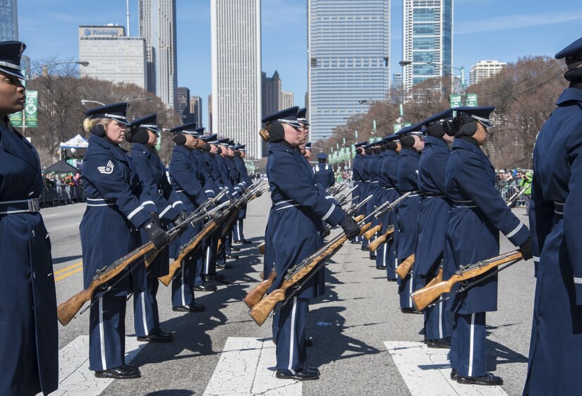 The U.S. Air Force Honor Guard performs drill movements during the annual Chicago St. Patrick’s Day Parade, March 11, 2017. While in Chicago, the team prepared uniforms, displayed their drill capabilities and marched a total of two miles in two parades to represent the Air Force and its Airmen to the American public. (U.S. Air Force photo by Senior Airman Jordyn Fetter)