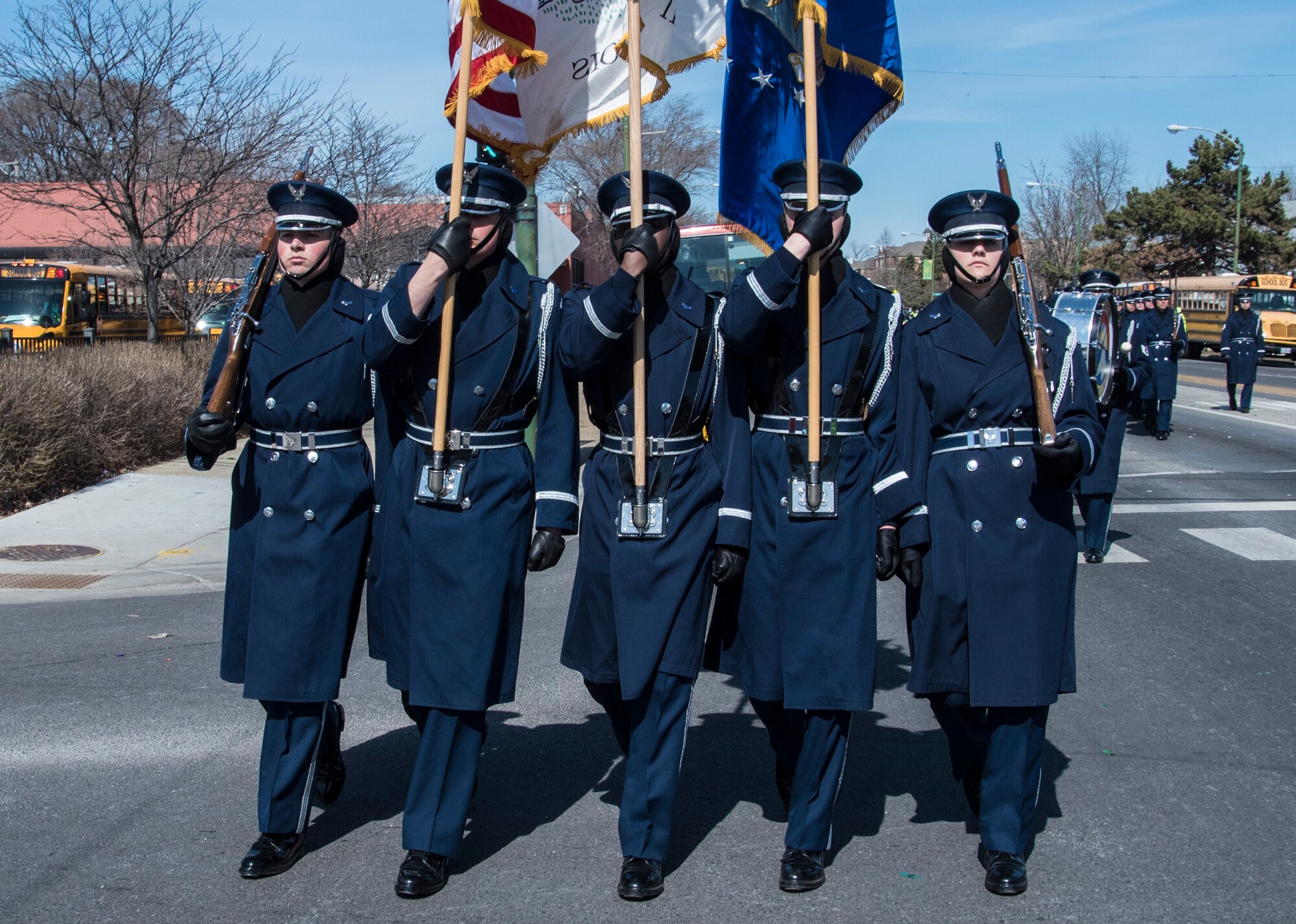 A color guard unit with the U.S. Air Force Color Guard marches in the South Side Irish St. Patrick’s Day Parade in Chicago, March 12, 2017. This community outreach event lined up with the honor guard’s vision of promoting the Air Force mission, protecting their standards, perfecting their image and preserving their heritage. (U.S. Air Force photo by Senior Airman Jordyn Fetter)