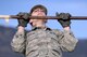 A freshman cadet at the U.S. Air Force Academy, Colorado, does a pull up. March 10, 2017, during Recognition. Recognition is a rigorous annual event freshmen, or "four degrees," must overcome before earning the status and responsibilities of "recognized cadet." (U.S. Air Force photo/Darcie Ibidapo)