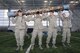 Freshmen cadets hold up a heavy log during Recognition, March 10, 2017, at the U.S. Air Force Academy, Colorado. Recognition is a rigorous annual event freshmen or "four degrees" must overcome before earning the status of "recognized cadet." (U.S. Air Force photo/Jason Gutierrez)   