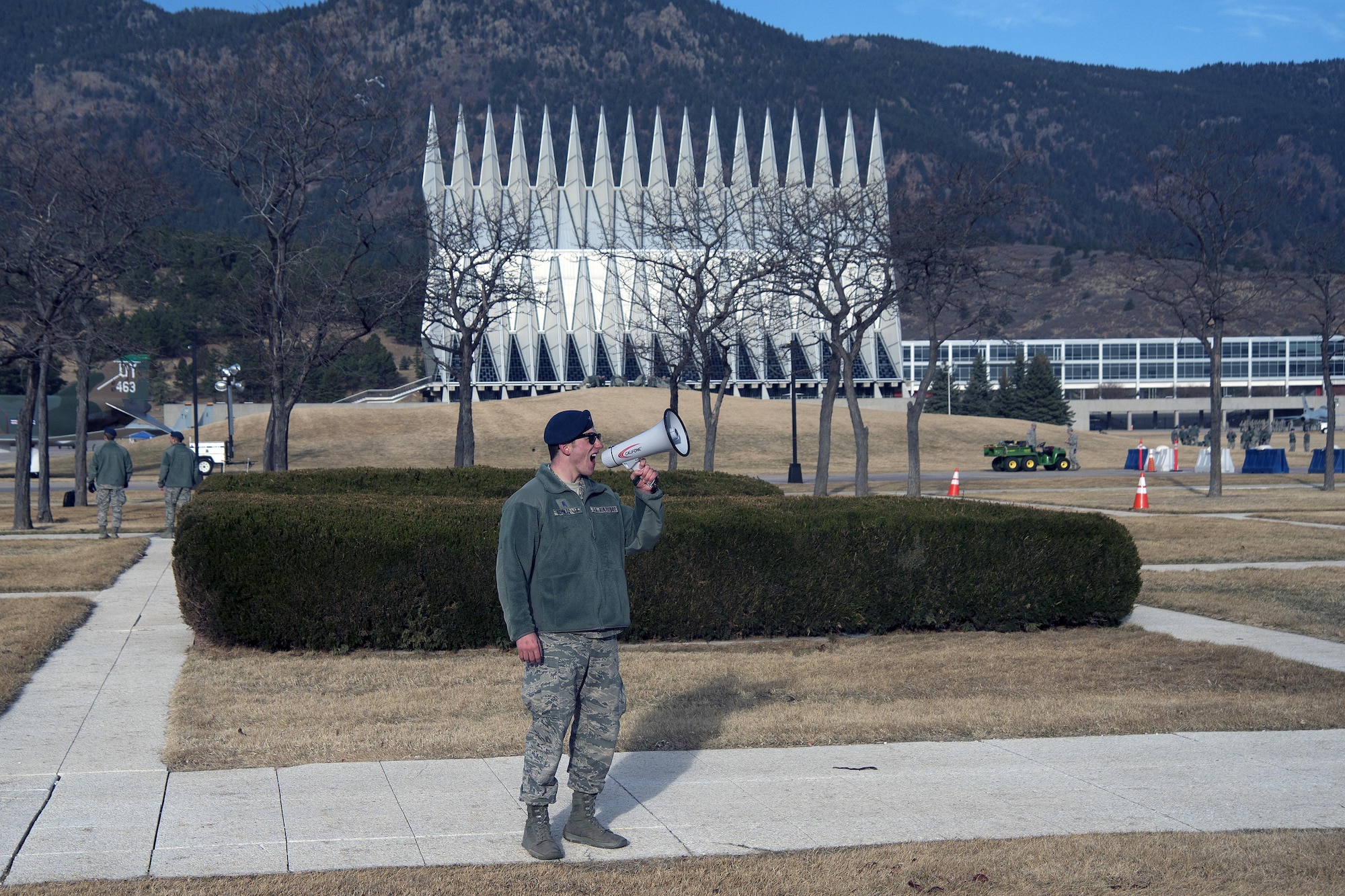 A senior cadet at the U.S. Air Force Academy, Colorado, uses a megaphone to get the attention of freshmen cadets March 10, 2017 during Recognition. Recognition is a rigorous annual event freshmen or "four degrees" must overcome before earning the status of "recognized cadet" at the Academy.  (U.S. Air Force photo/Bill Evans)