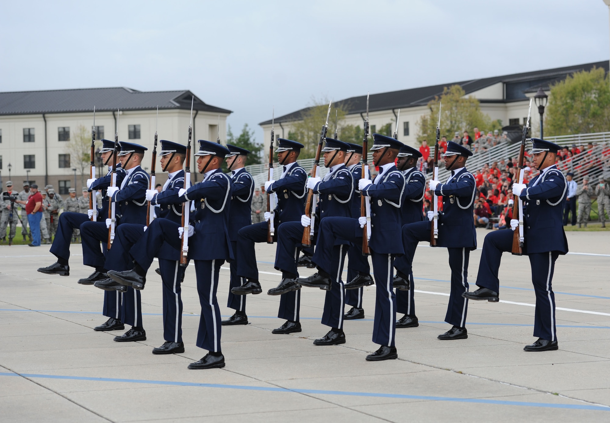 The U.S. Air Force Honor Guard Drill Team deputes their 2017 routine during the 81st Training Group drill down at the Levitow Training Support Facility drill pad March 10, 2017, on Keesler Air Force Base, Miss. The team comes to Keesler every year for five weeks to develop a new routine that they will use throughout the year. (U.S. Air Force photo by Kemberly Groue)