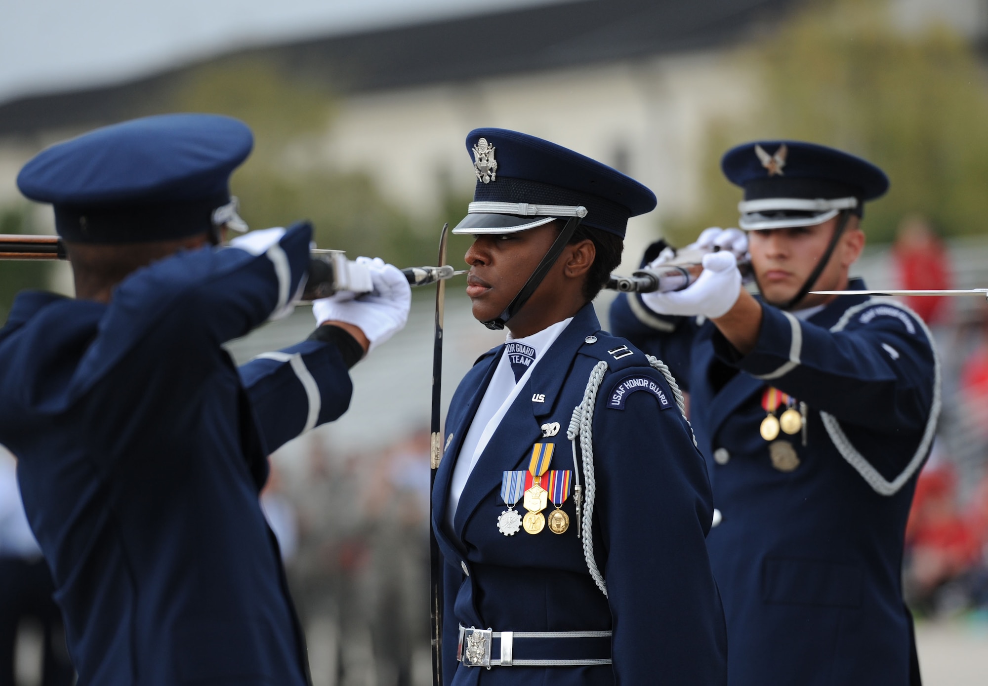 Capt. Angele Montfort, U.S. Air Force Honor Guard Drill Team commander, participates in the debut performance of the team’s 2017 routine during the 81st Training Group drill down at the Levitow Training Support Facility drill pad March 10, 2017, on Keesler Air Force Base, Miss. The team comes to Keesler every year for five weeks to develop a new routine that they will use throughout the year. (U.S. Air Force photo by Kemberly Groue)