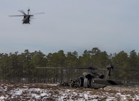 Army Reserve UH-60 Black Hawk Helicopters from 8th Battalion, 229th Aviation Regiment, based out of Fort Knox, Ky., drop off Soldiers assigned to the 101st Airborne Division (Air Assault) at Lakehurst Maxfield Field during a multi-component airfield seizure training exercise between the Army Reserve and the 101st Airborne Division on March 13, 2017 to kick off Warrior Exercise 78-17-01. Several Army Reserve organizations including the Army Reserve Aviation Command, 84th Training Command, 78th Training Division, and members of the 200th Military Police Command helped Easy Company, 2nd Battalion, 506th Parachute Infantry Regiment, 101st Airborne Division conduct the mission. Roughly 60 units from the U.S. Army Reserve, U.S. Army, U.S. Air Force, and Canadian Armed Forces are participating in the 84th Training Command’s joint training exercise, WAREX 78-17-01, at Joint Base McGuire-Dix-Lakehurst from March 8 until April 1, 2017; the WAREX is a large-scale collective training event designed to assess units’ combat capabilities as America’s Army Reserve continues to build the most capable, combat-ready, and lethal Federal Reserve force in the history of the Nation. (Army Reserve Photo by Sgt. Stephanie Ramirez/ Released)