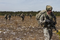 Army Soldiers assigned to the 101st Airborne Division (Air Assault) move in a formation to assault through an objective at Lakehurst Maxfield Field during a multi-component airfield seizure training exercise between the Army Reserve and the 101st Airborne Division on March 13, 2017 to kick off Warrior Exercise 78-17-01. Several Army Reserve organizations including the Army Reserve Aviation Command, 84th Training Command, 78th Training Division, and members of the 200th Military Police Command helped Easy Company, 2nd Battalion, 506th Parachute Infantry Regiment, 101st Airborne Division conduct the mission. Roughly 60 units from the U.S. Army Reserve, U.S. Army, U.S. Air Force, and Canadian Armed Forces are participating in the 84th Training Command’s joint training exercise, WAREX 78-17-01, at Joint Base McGuire-Dix-Lakehurst from March 8 until April 1, 2017; the WAREX is a large-scale collective training event designed to assess units’ combat capabilities as America’s Army Reserve continues to build the most capable, combat-ready, and lethal Federal Reserve force in the history of the Nation. (Army Reserve Photo by Sgt. Stephanie Ramirez/ Released)