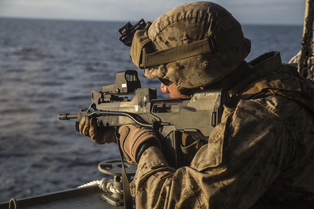 A U.S. Marine assigned to Black Sea Rotational Force practices firing the French Marines FAMAS-G2 assault rifle during a live-fire range aboard the French ship Mistral in the Mediterranean Sea, March 5, 2017, as part of the Exercise Joanne d’Arc. U.S. Marines jointly conducted a live-fire range with French Marines to enhance core infantry skills, broaden knowledge of different weapons systems and to develop camaraderie between the NATO partners.