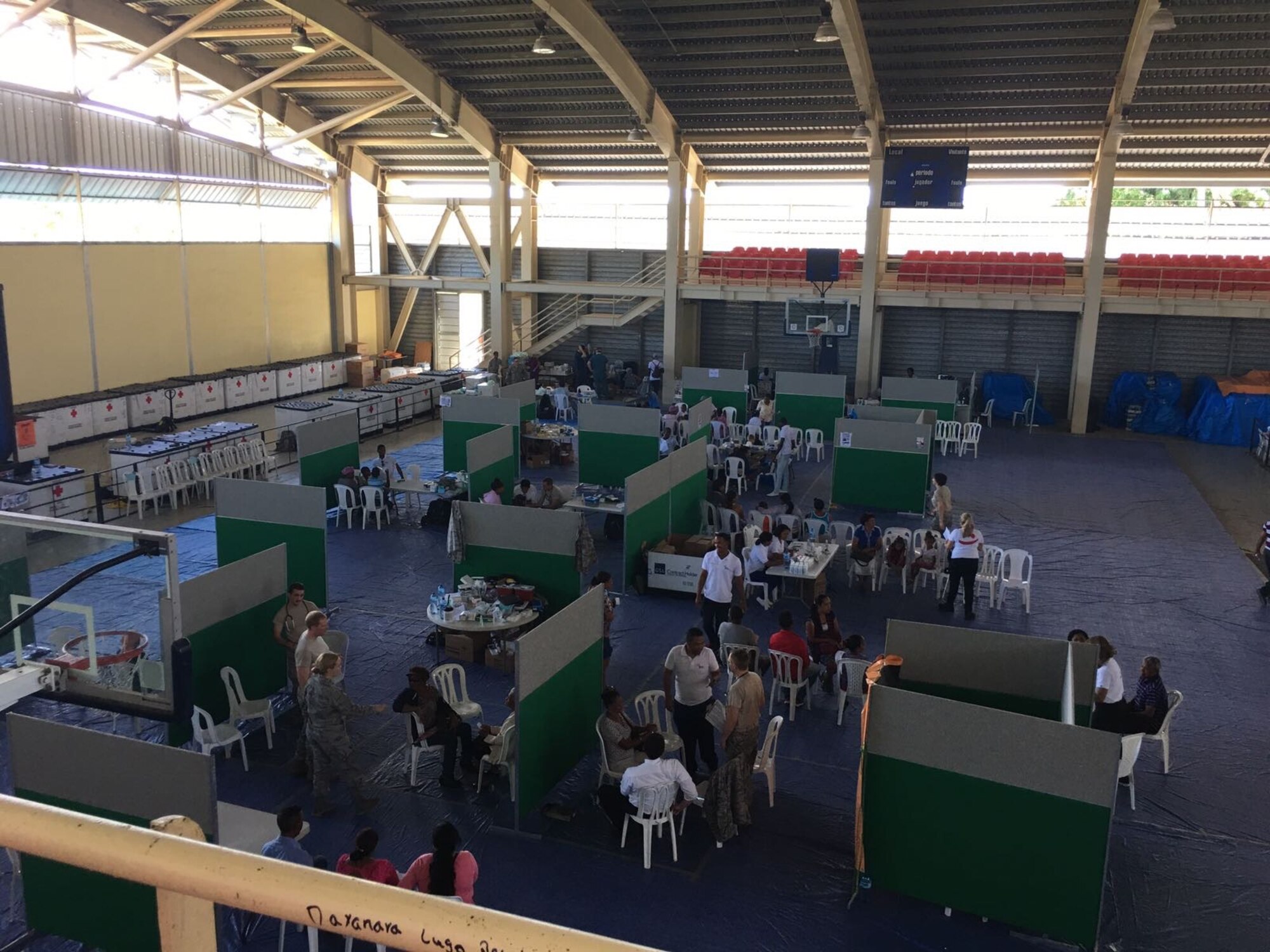 A team of providers operating from a makeshift clinic they set up, offer medical care in Azua, Dominican Republic, as part of Operation New Horizons, an exercise run by Air Force South, March 3-18, 2017. A team from 21st Medical Group, Peterson Air Force Base, Colo., is leading the initial phase of the exercise for the first time since the operation began almost 20 years ago. (Courtesy photo)