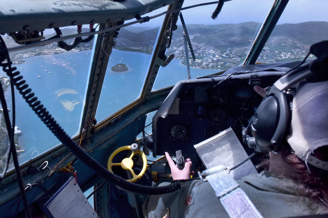 Puerto Rico Air National Guard Maj. Isbelia Reyes, aircraft commander, flies a C-130 Hercules over Puerto Rico, March 9, 2017. Air National Guard photo by Master Sgt. Edgar Morell