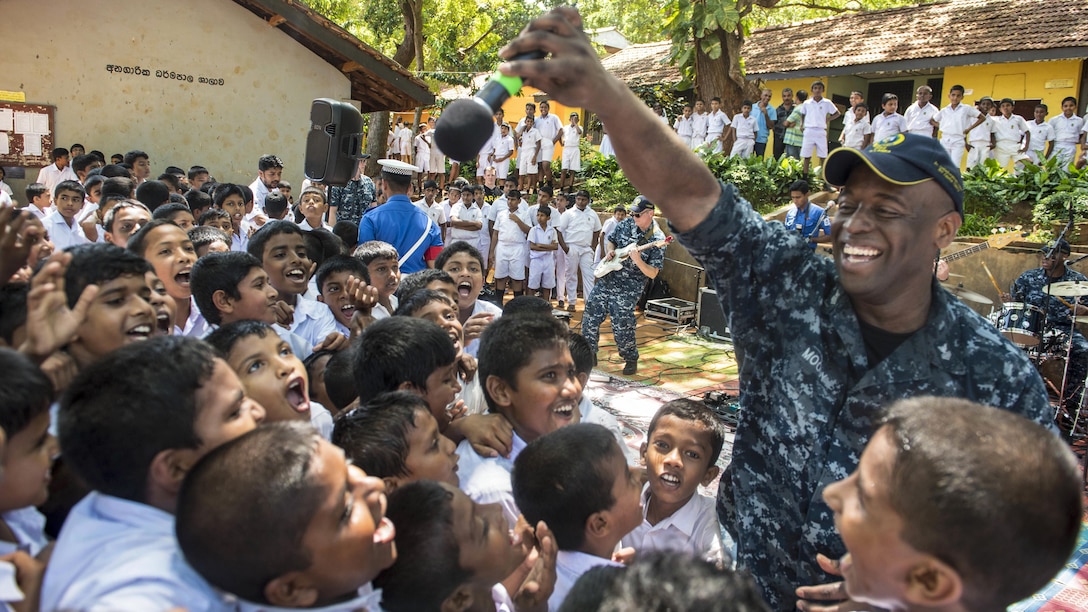 Navy Petty Officer 1st Class Vince Moody performs at St. Mary’s National School while participating in a community event during Pacific Partnership 2017 in Hambantota, Sri Lanka, March 13, 2017. Moody is a musician assigned to the U.S. 7th Fleet Band, Far East Edition. The humanitarian relief exercise aims to enhance regional coordination in areas such as medical readiness and preparedness for manmade and natural disasters. Navy photo by Petty Officer 2nd Class Joshua Fulton