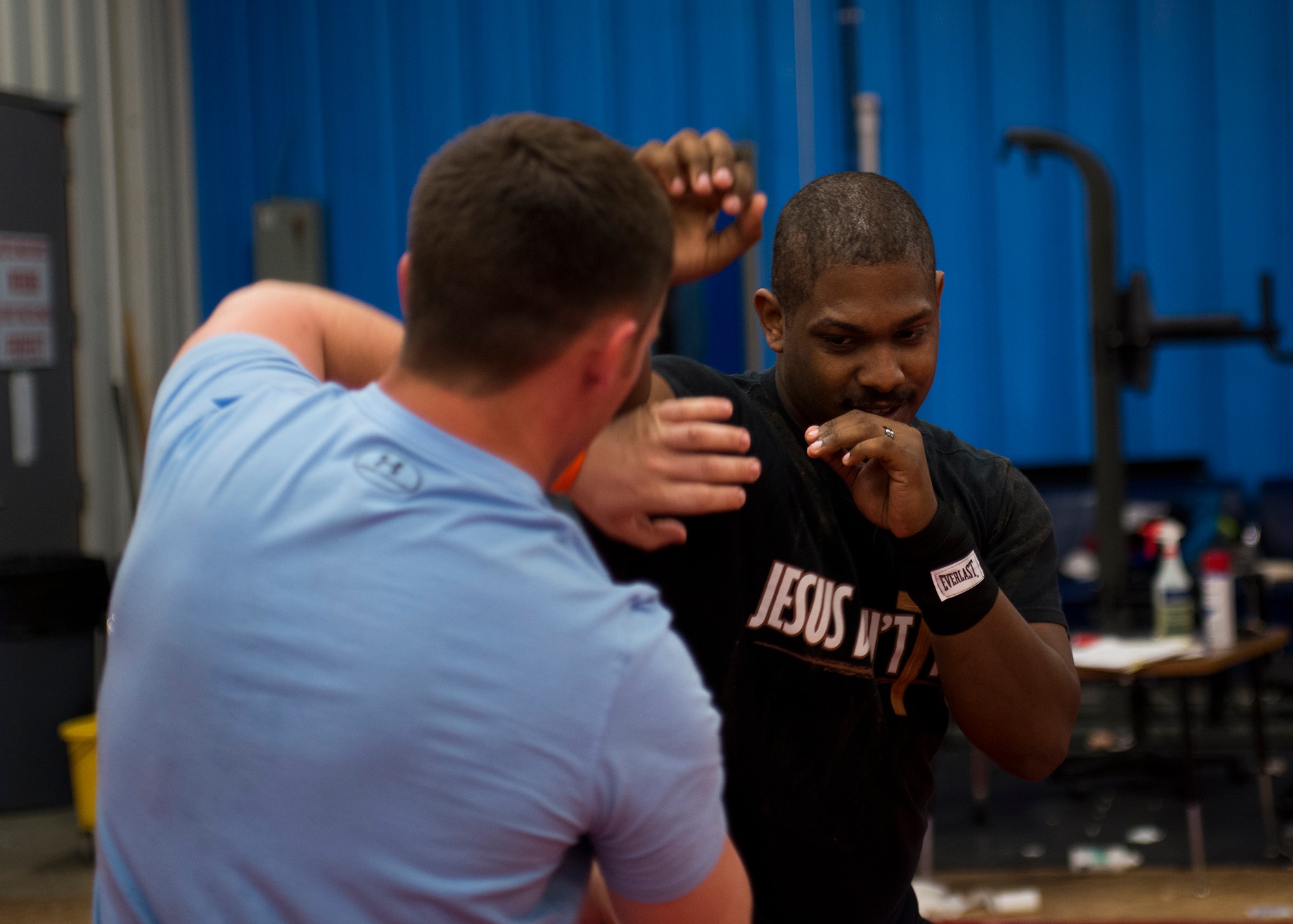 Senior Airmen Julian Tyson and Dustin Bradley, members of the 138th Security Forces Squadron, participate in annual combative training on Feb. 11, 2017 in Collinsville, OK. During the two-day training, defenders learned how to protect themselves and control their adversary during armed and unarmed attacks. (U.S. Air Force photo by Senior Airman Rebecca Imwalle)