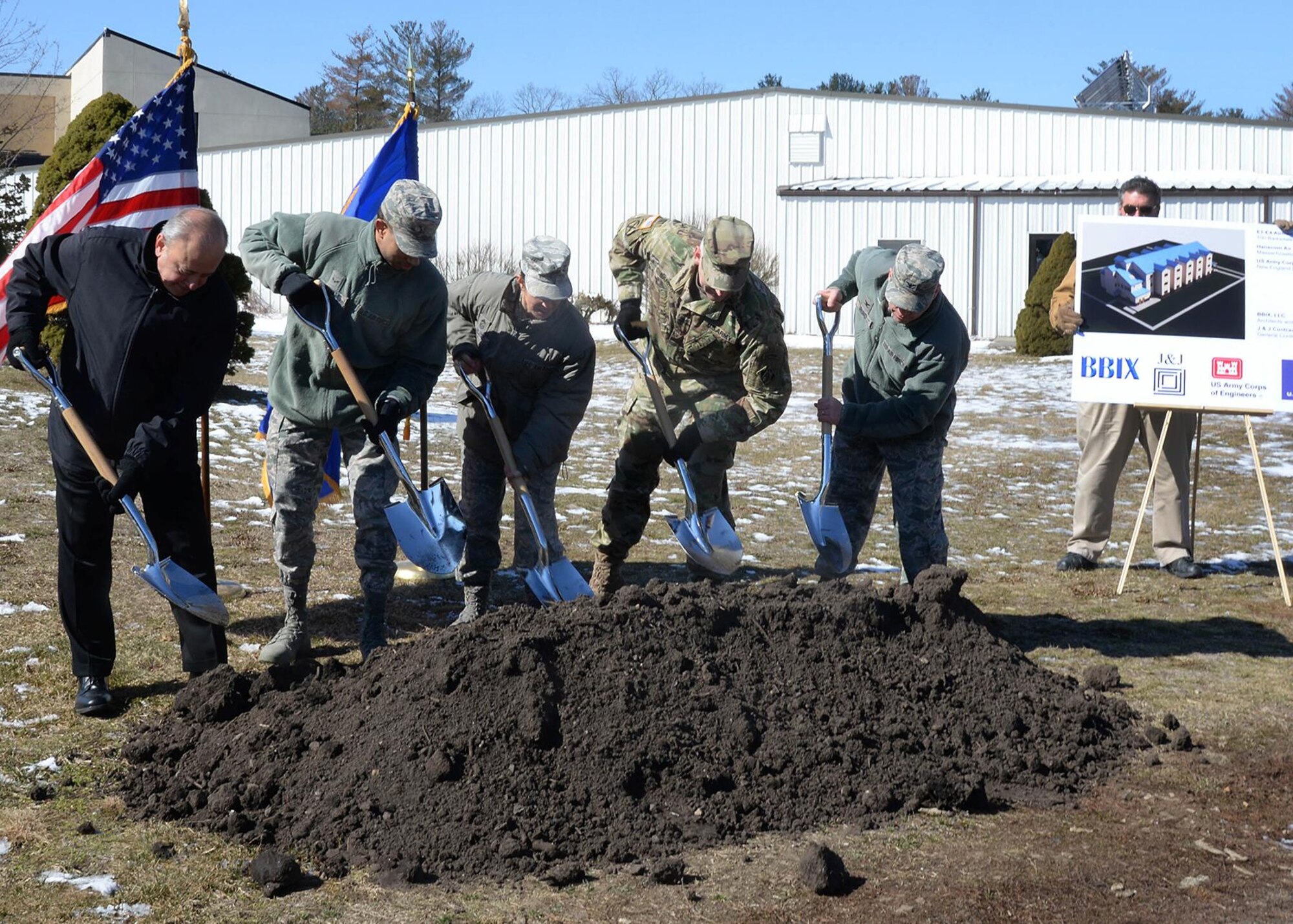 Members of the official party break ground on a 25,000-square-foot enlisted dormitory during a groundbreaking ceremony on base March 13. Participating in the ceremony, from left-to-right, is Allen Shaffi, BBIX partner; Airman 1st Class Kenzie Williams, Dorm Council president; Command Chief Master Sgt. Patricia L. Hickey; Army Col. Christopher Barron, commander of Army Corps of Engineers New England District; and Col. Roman L. Hund, installation commander. (U.S. Air Force photo by Linda LaBonte Britt)