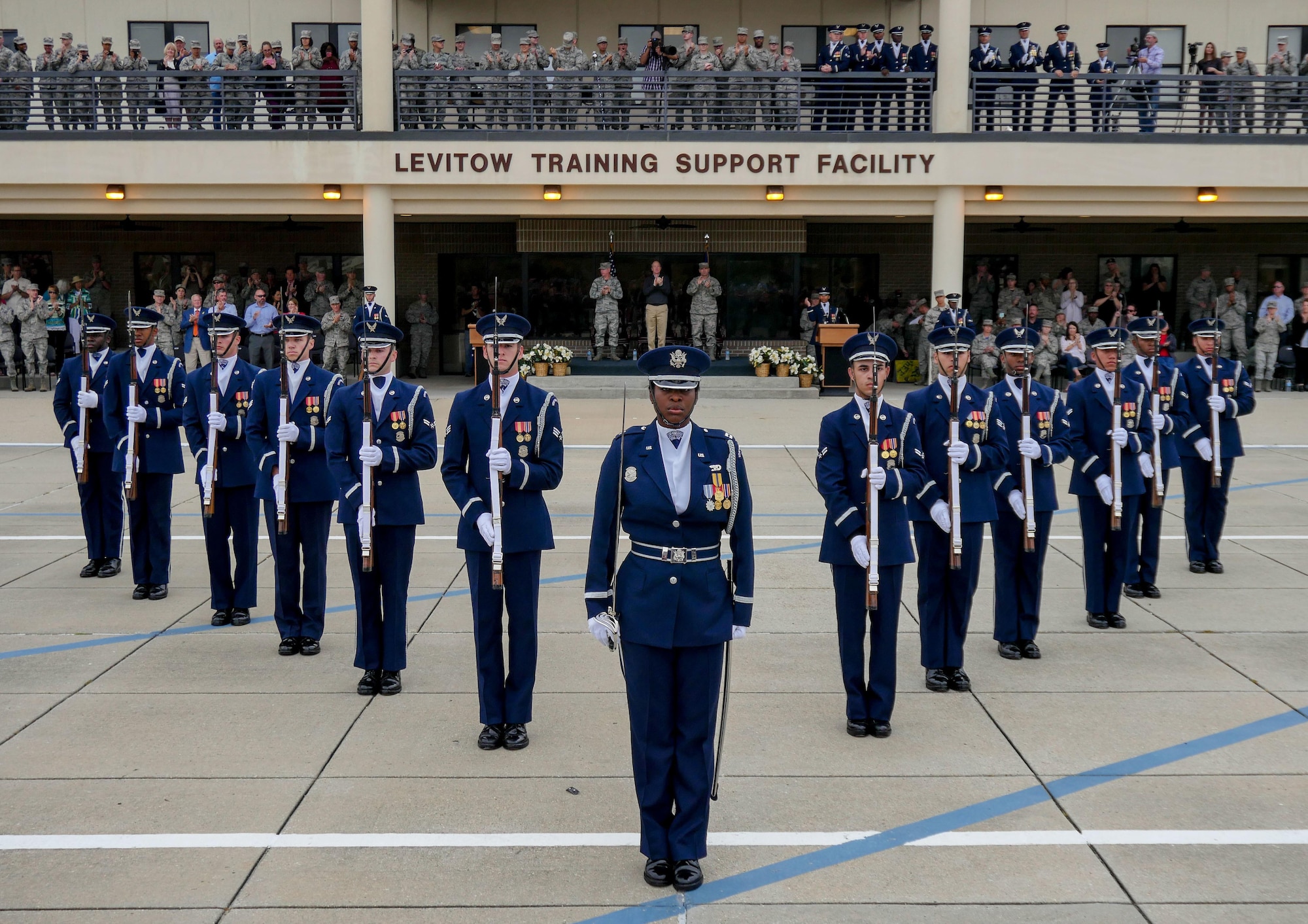 The U.S. Air Force Honor Guard Drill Team debuts their 2017 routine during the 81st Training Group drill down at the Levitow Training Support Facility drill pad March 10, 2017, on Keesler Air Force Base, Miss. The team comes to Keesler every year for five weeks to develop a new routine that they will use throughout the year. (U.S. Air Force photo by Capt. David J. Murphy)