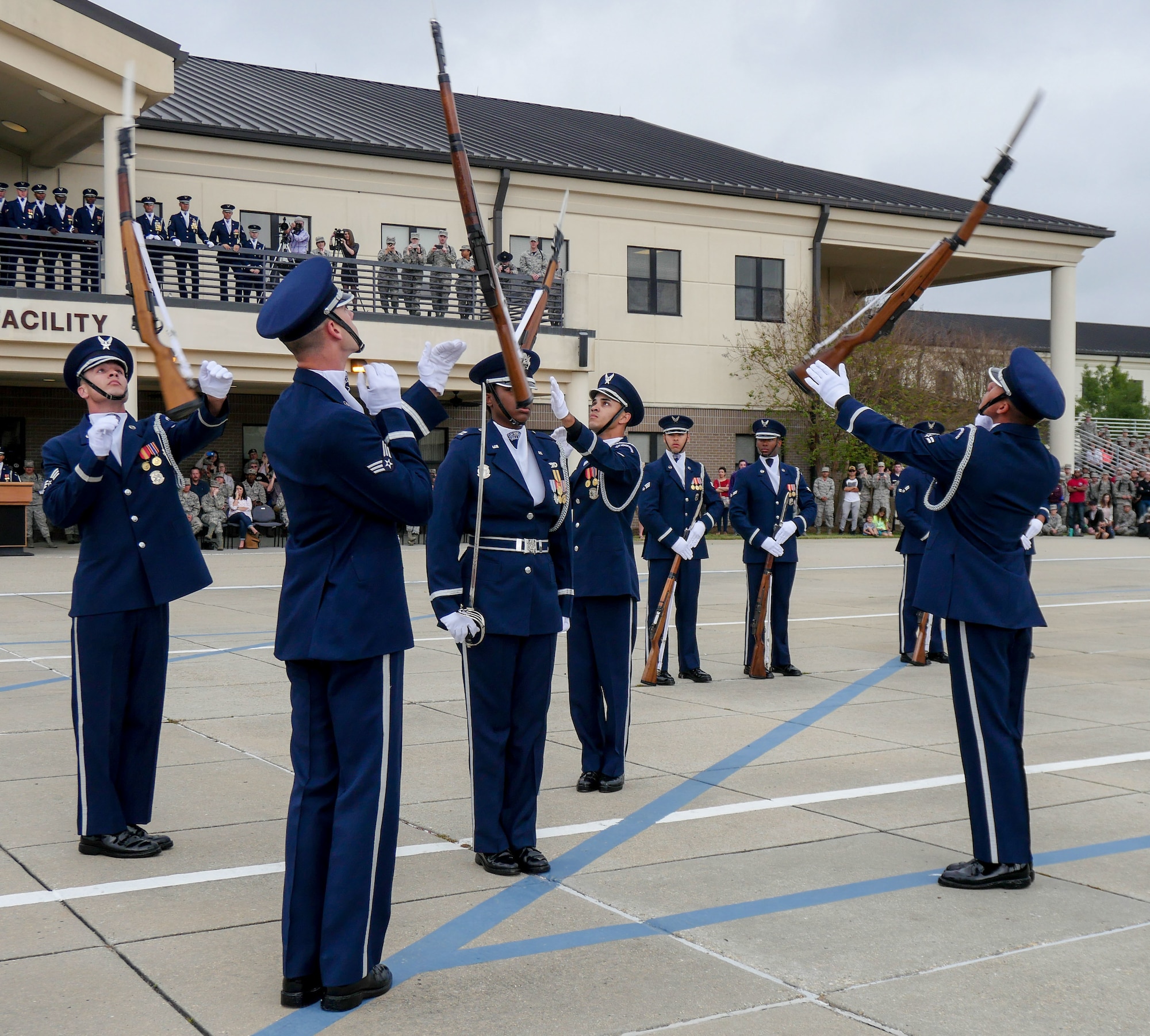 The U.S. Air Force Honor Guard Drill Team debuts their 2017 routine during the 81st Training Group drill down at the Levitow Training Support Facility drill pad March 10, 2017, on Keesler Air Force Base, Miss. The team comes to Keesler every year for five weeks to develop a new routine that they will use throughout the year. (U.S. Air Force photo by Capt. David J. Murphy)