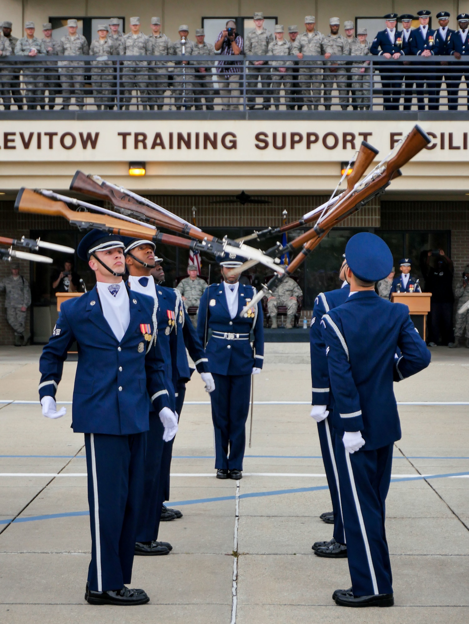 The U.S. Air Force Honor Guard Drill Team debutes their 2017 routine during the 81st Training Group drill down at the Levitow Training Support Facility drill pad March 10, 2017, on Keesler Air Force Base, Miss. The team comes to Keesler every year for five weeks to develop a new routine that they will use throughout the year. (U.S. Air Force photo by Capt. David J. Murphy)