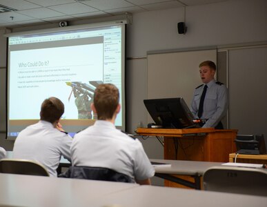 William Bryce Carpenter, University of Anchorage Alaska ROTC cadet, briefs his classmates on his experience shadowing Air Force 1st Lt. Jonathan Quinlan, assistant officer in charge of the 525th Aircraft Maintenance Unit, in Anchorage, March 10, 2017. The UAA ROTC cadets shadowed different Joint Base Elmendorf-Richardson officers to get a better understanding of what that officer's job is. 