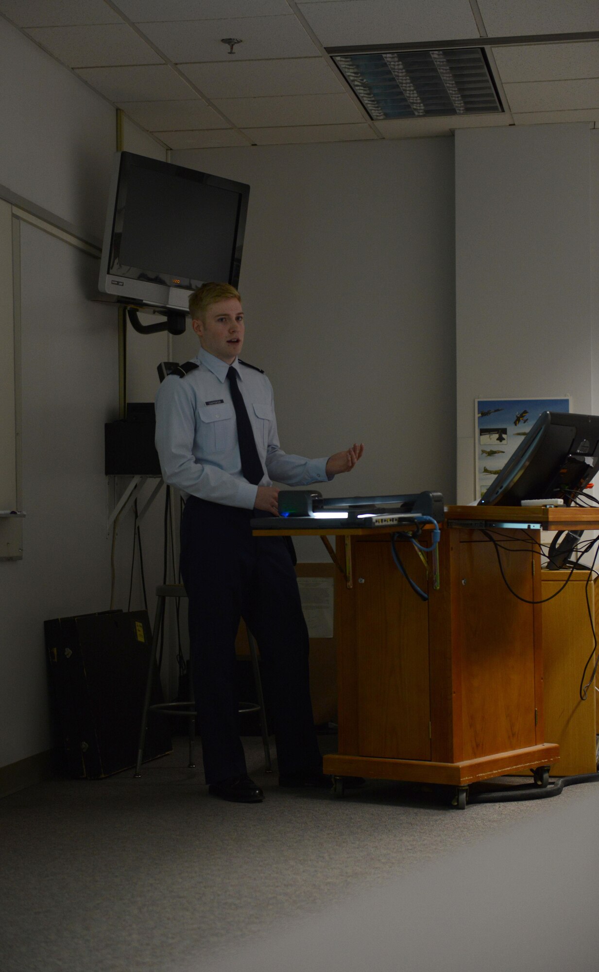 William Bryce Carpenter, University of Anchorage Alaska ROTC cadet, briefs his classmates on his experience shadowing Air Force 1st Lt. Jonathan Quinlan, assistant officer in charge of the 525th Aircraft Maintenance Unit, in Anchorage, March 10, 2017. The UAA ROTC cadets shadowed different Joint Base Elmendorf-Richardson officers to get a better understanding of what that officer's job is. 