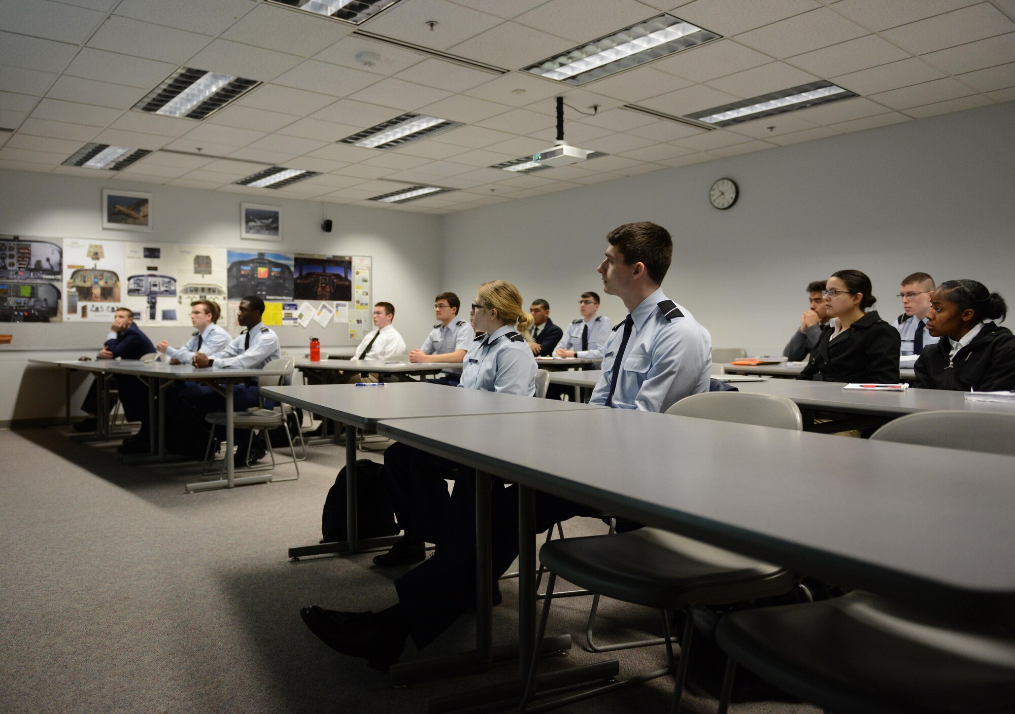 William Bryce Carpenter, University of Anchorage Alaska ROTC cadet, briefs his classmates on his experience shadowing Air Force 1st Lt. Jonathan Quinlan, assistant officer in charge of the 525th Aircraft Maintenance Unit, in Anchorage, March 10, 2017. The UAA ROTC cadets shadowed different Joint Base Elmendorf-Richardson officers to get a better understanding of what that officer's job is. 