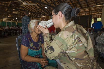 Capt. Frances M. Silva gives an eye exam to a Sri Lankan patient at the Sooriyawewa National School medical site during Pacific Partnership 2017. Pacific Partnership is the largest annual multilateral humanitarian assistance and disaster relief preparedness mission conducted in the Indo-Asia-Pacific and aims to enhance regional coordination in areas such as medical readiness and preparedness for manmade and natural disasters. 