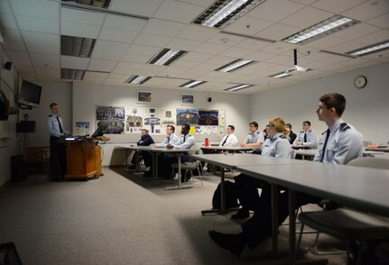 William Bryce Carpenter, University of Anchorage Alaska ROTC cadet, briefs his classmates on his experience shadowing Air Force 1st Lt. Jonathan Quinlan, assistant officer in charge of the 525th Aircraft Maintenance Unit, in Anchorage, March 10, 2017. The UAA ROTC cadets shadowed different Joint Base Elmendorf-Richardson officers to get a better understanding of what that officer's job is. 