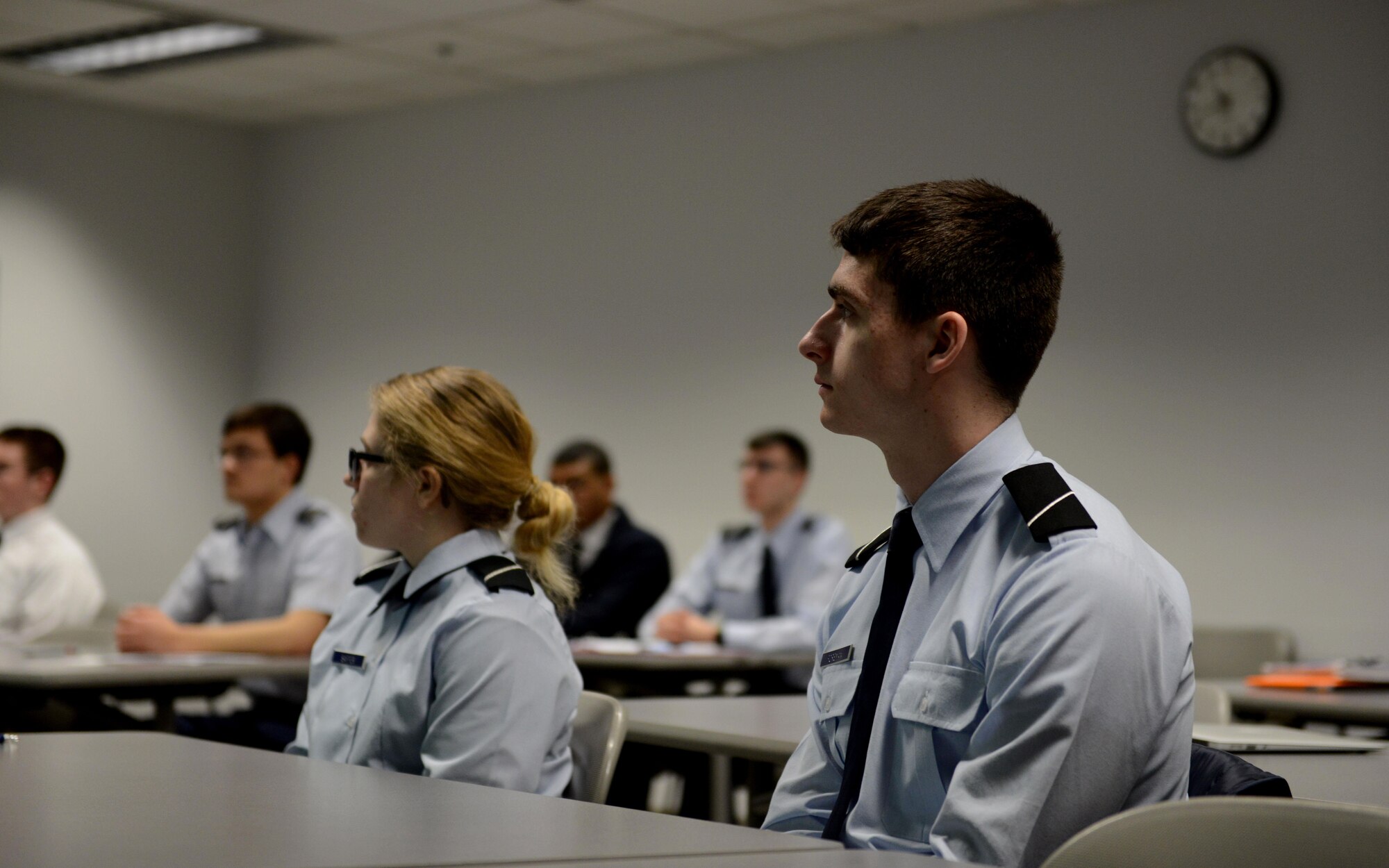 William Bryce Carpenter, University of Anchorage Alaska ROTC cadet, briefs his classmates on his experience shadowing Air Force 1st Lt. Jonathan Quinlan, assistant officer in charge of the 525th Aircraft Maintenance Unit, in Anchorage, March 10, 2017. The UAA ROTC cadets shadowed different Joint Base Elmendorf-Richardson officers to get a better understanding of what that officer's job is. 