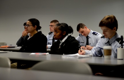 William Bryce Carpenter, University of Anchorage Alaska ROTC cadet, briefs his classmates on his experience shadowing Air Force 1st Lt. Jonathan Quinlan, assistant officer in charge of the 525th Aircraft Maintenance Unit, in Anchorage, March 10, 2017. The UAA ROTC cadets shadowed different Joint Base Elmendorf-Richardson officers to get a better understanding of what that officer's job is. 