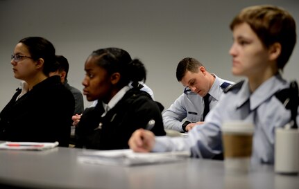 William Bryce Carpenter, University of Anchorage Alaska ROTC cadet, briefs his classmates on his experience shadowing Air Force 1st Lt. Jonathan Quinlan, assistant officer in charge of the 525th Aircraft Maintenance Unit, in Anchorage, March 10, 2017. The UAA ROTC cadets shadowed different Joint Base Elmendorf-Richardson officers to get a better understanding of what that officer's job is. 